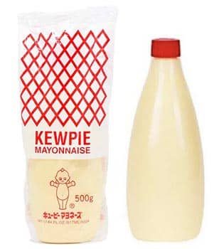 One kewpie mayo bottle in packaging and one outside on white background.